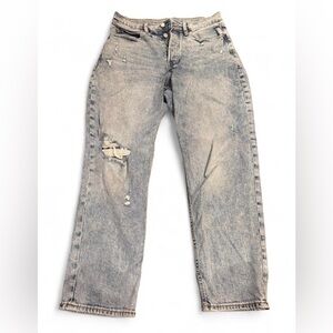Woman’s Distressed Light Blue Jeans
